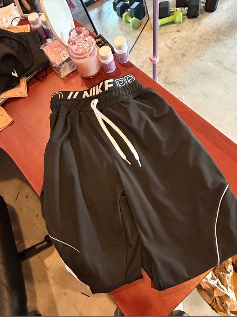 Nike Black Women's Wide-Leg Track Pants with White Stripe Accents M/L - Picture 2 of 3